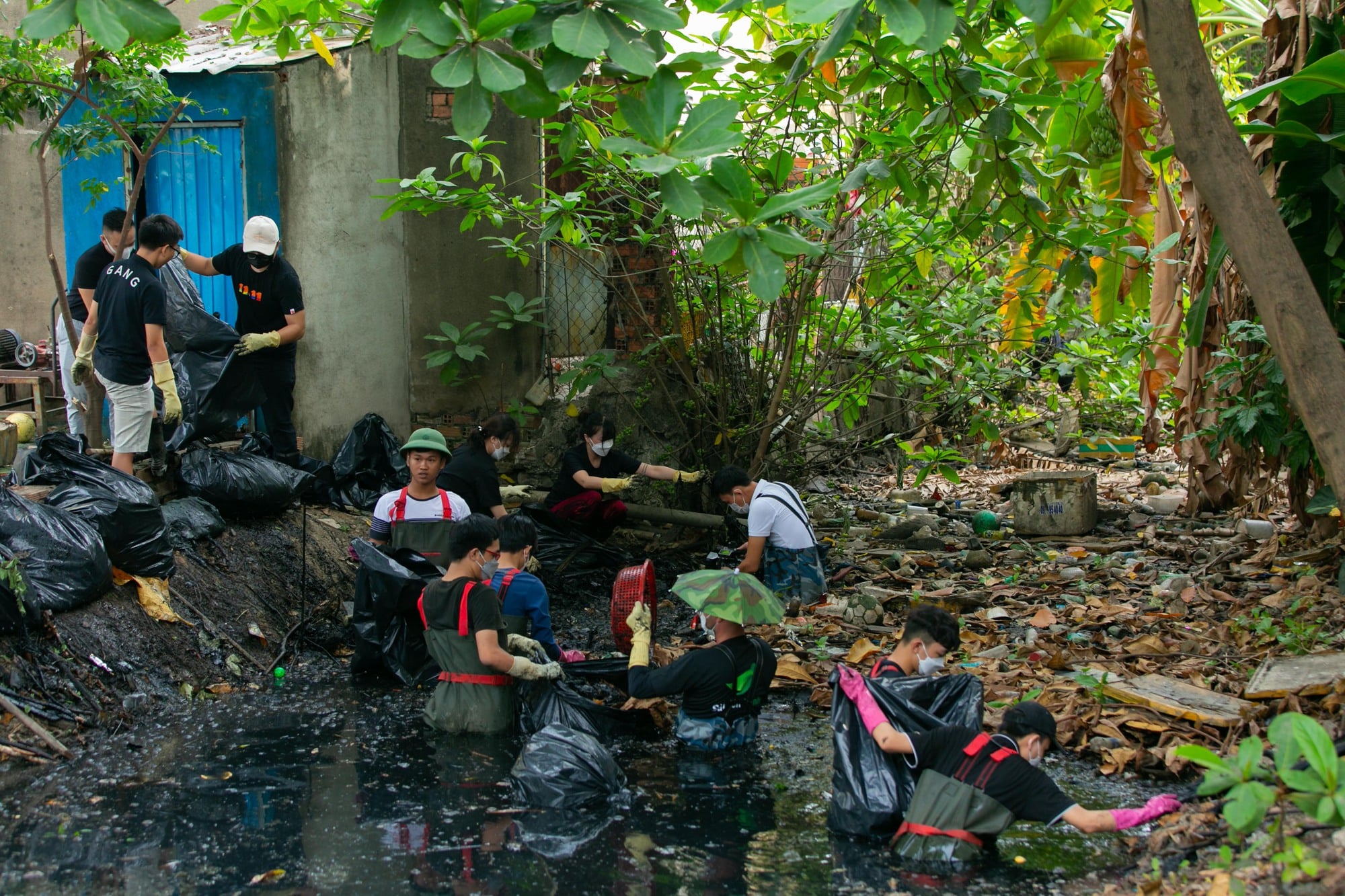 The Saigon Green squad soaks in the dark canal